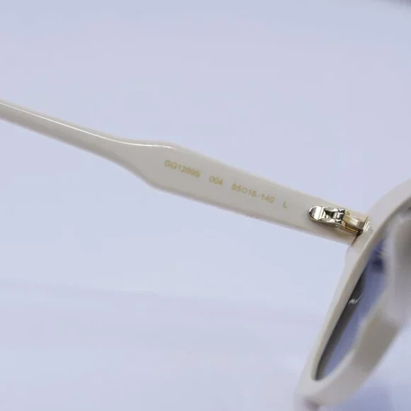 Gucci GG1299S 004 Sunglasses Ivory with Stones Cat Eye Frame, Blue Lenses